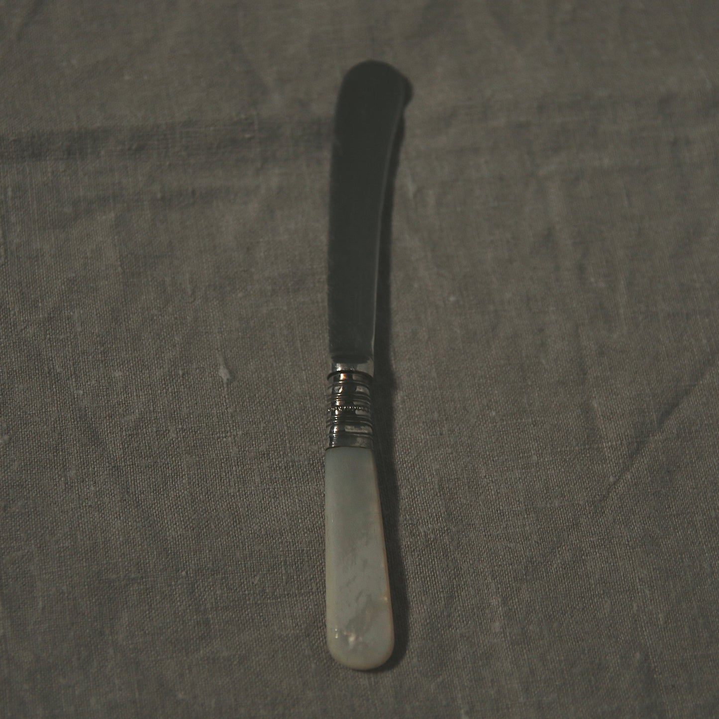 Mother of pearl butter knife D