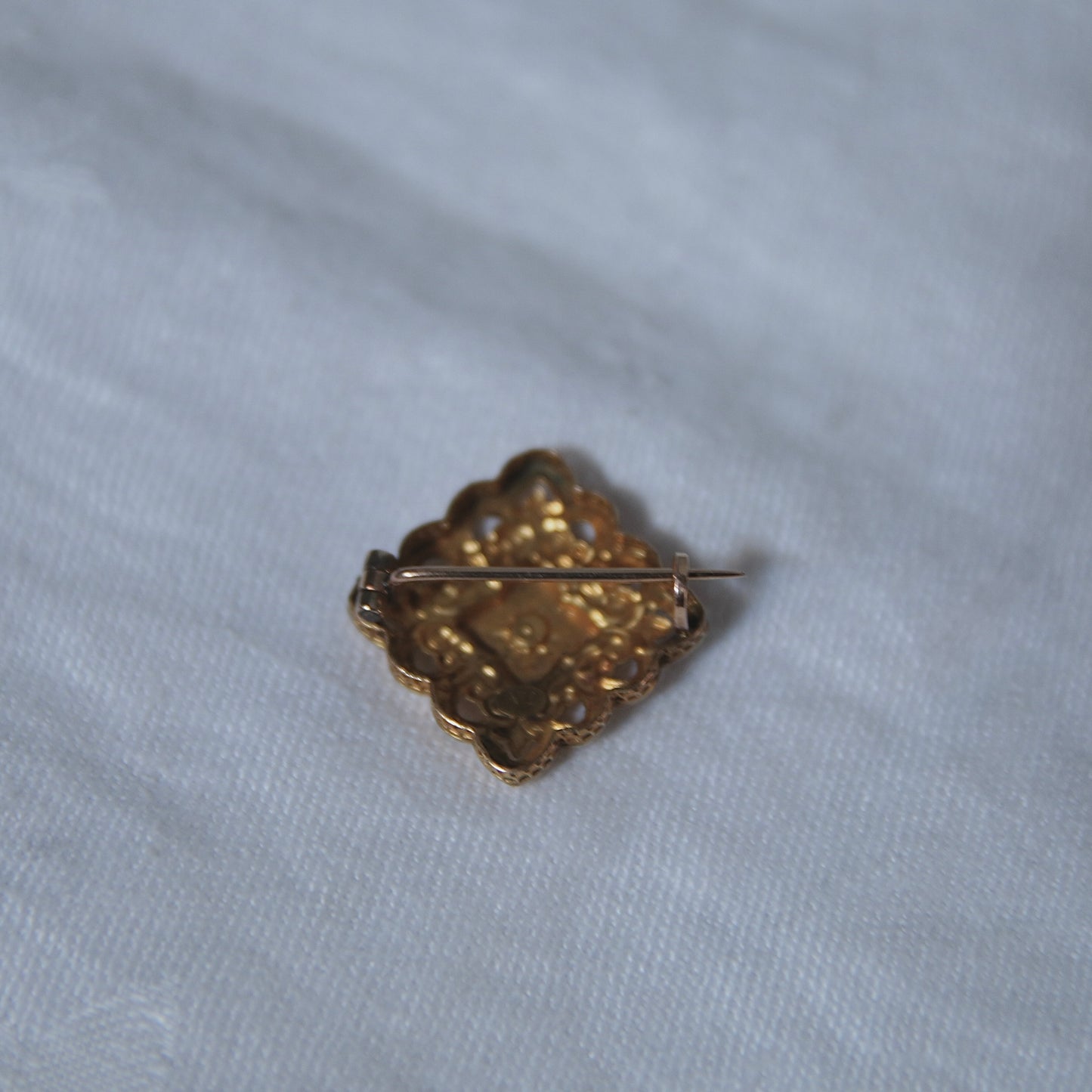 Gold brooch