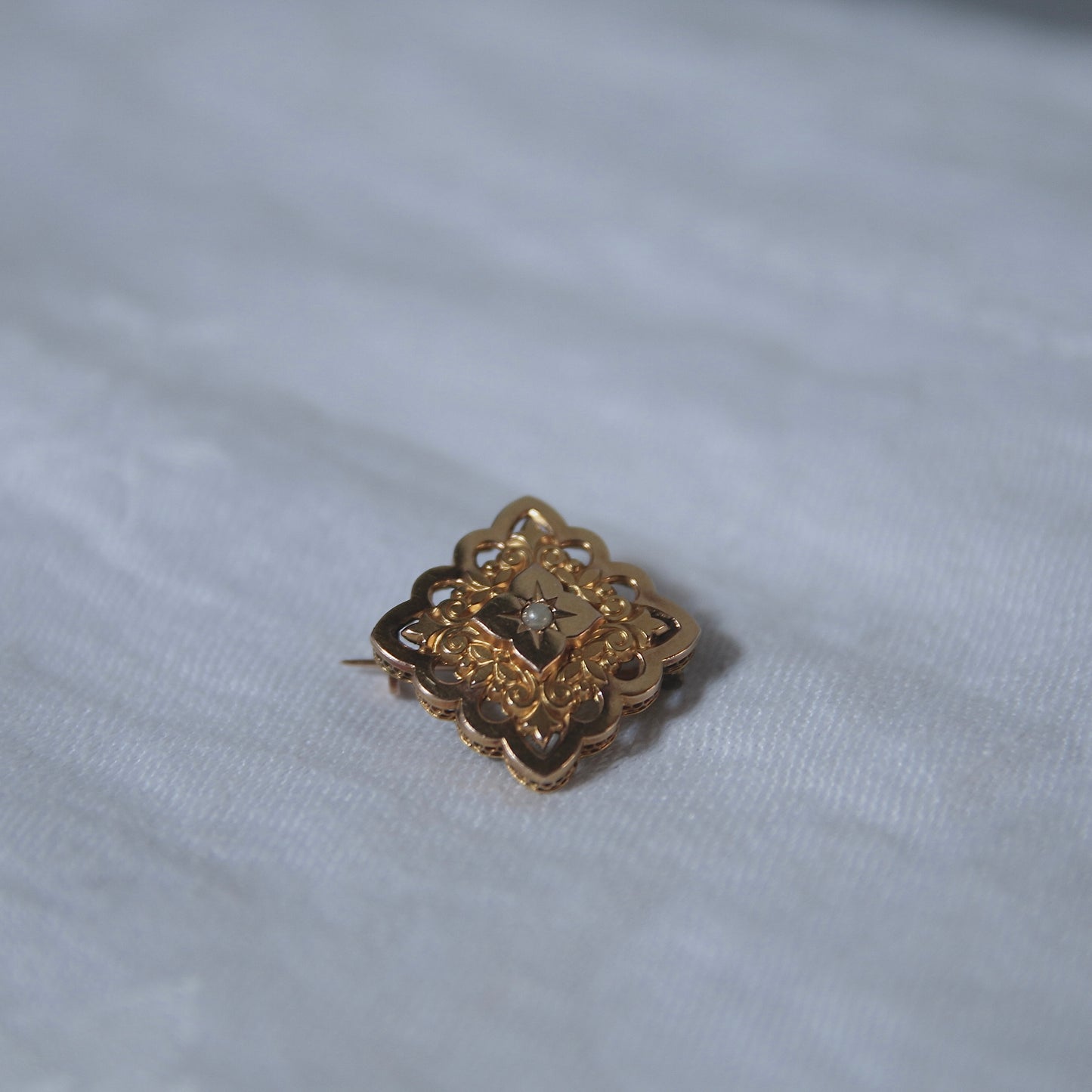 Gold brooch