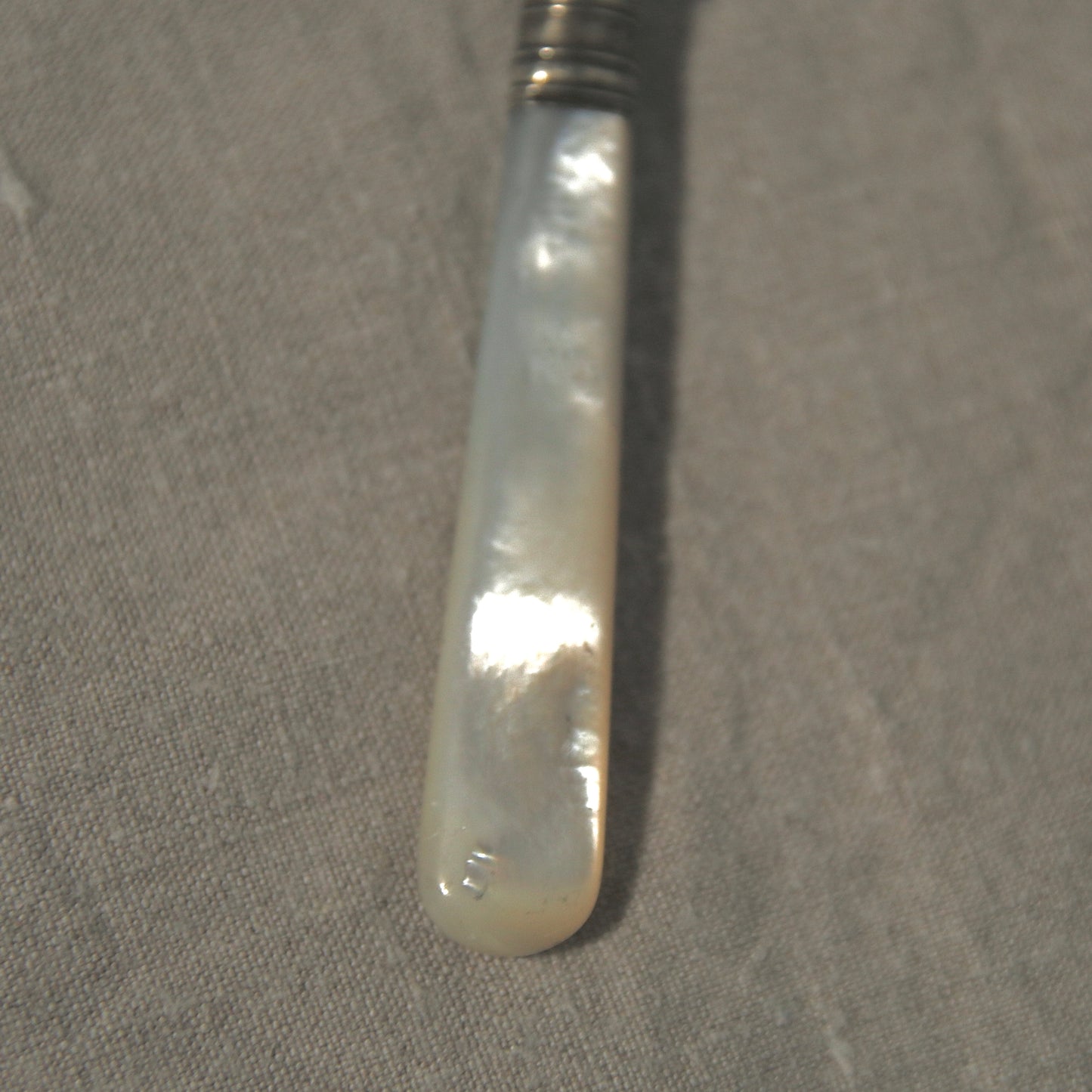 Mother of pearl butter knife A