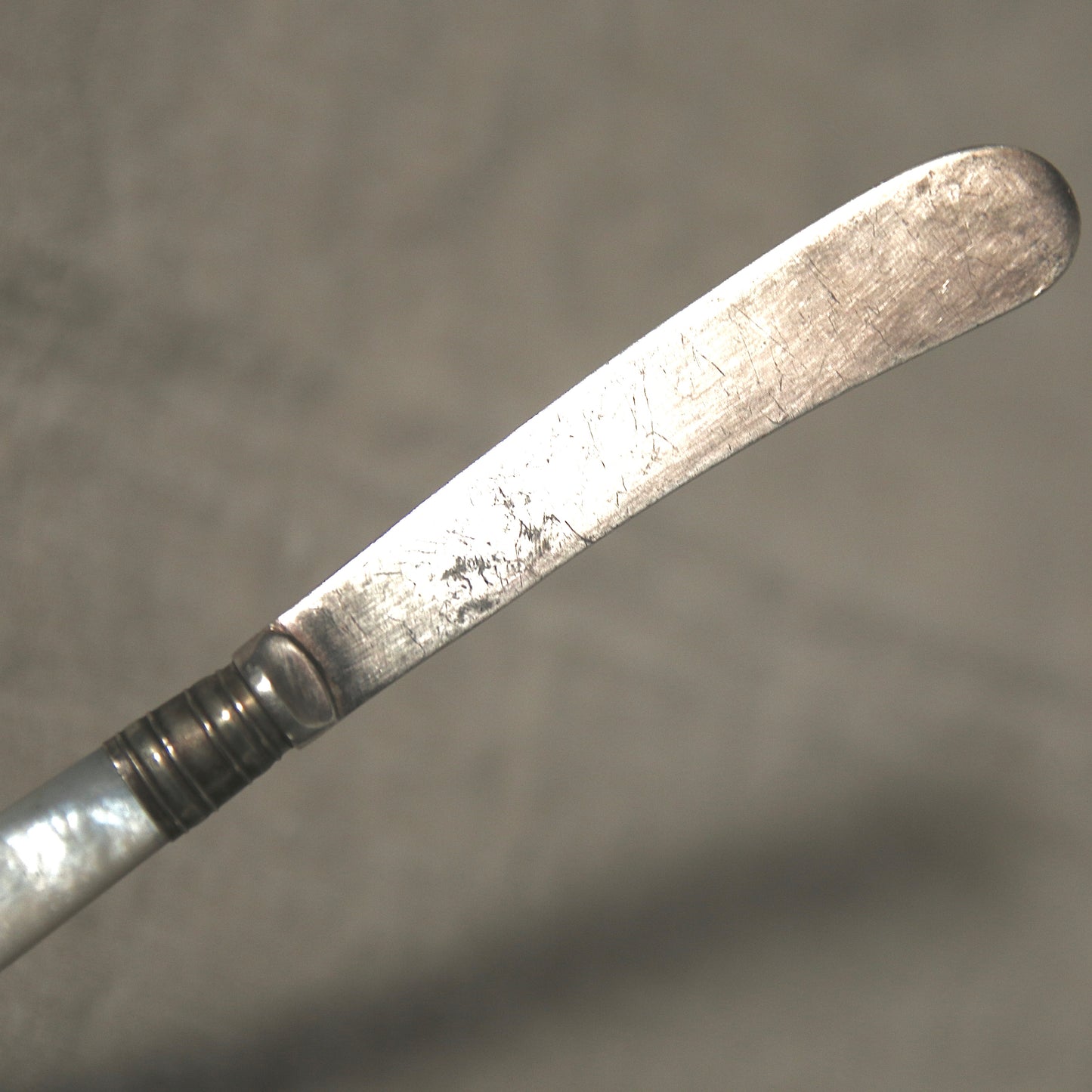 Mother of pearl butter knife A